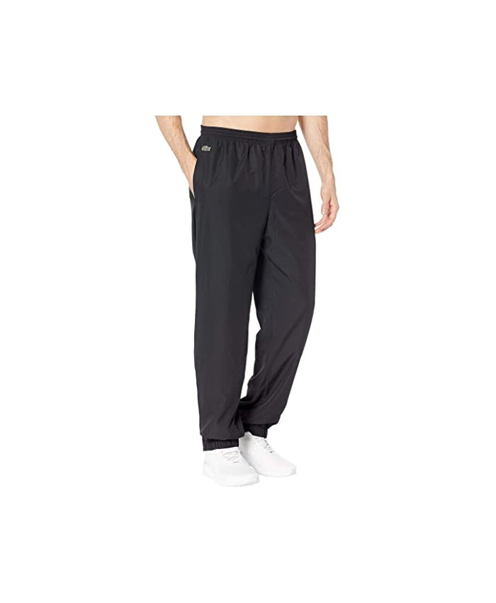 Lacoste Joggers with Lacoste Word Left Leg & Color-Block Stripe Detail on Right